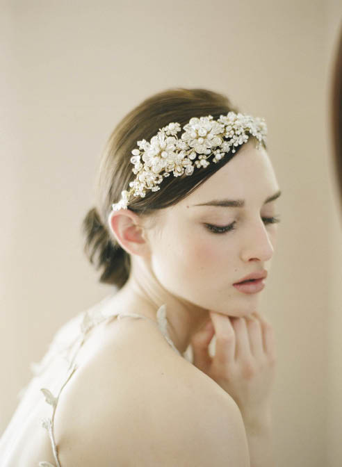 An amazing headpiece of crystals and golden faux flowers by Twigs & Honey (style 240) will make any bride feel regal on her wedding day. 