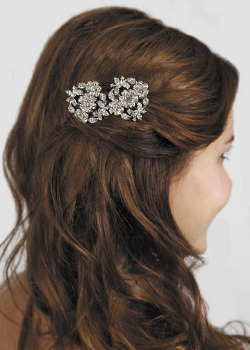 These rhinestone studded silver-plated hairpins in a floral design by Idojour make for a glamorous, vintage bridal look. $54. 